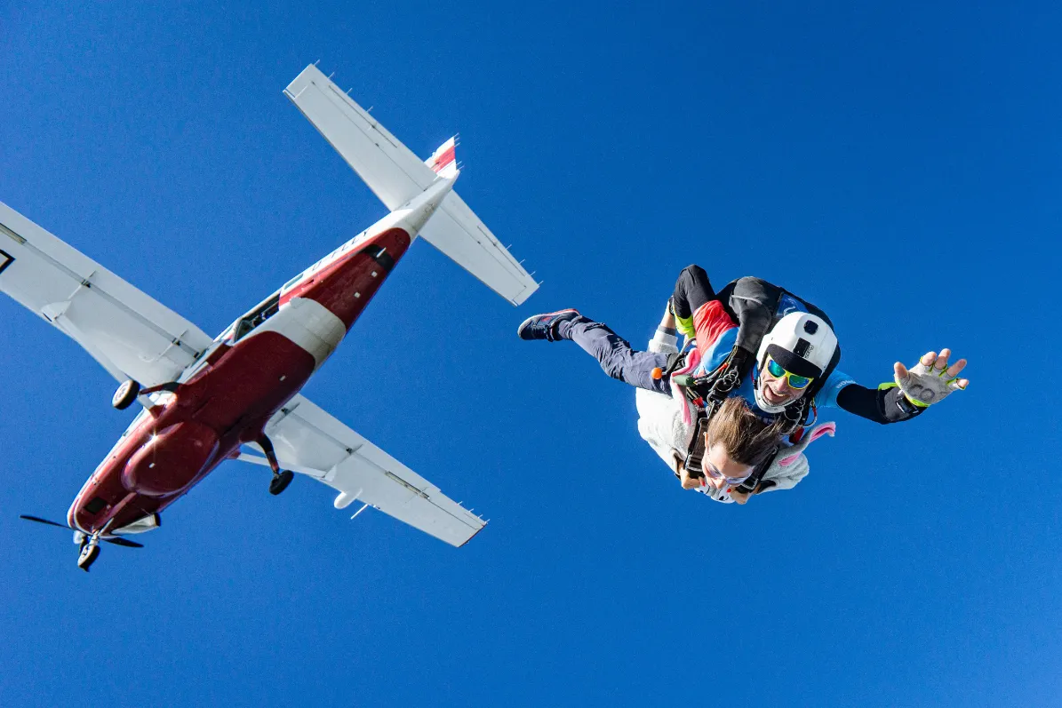 tandem skydive leaving plane