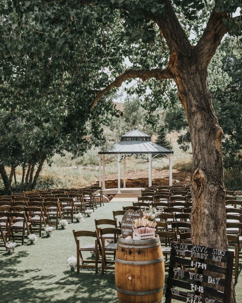 chairs and outdoor ceremony set up at the gazebo at creekside event center 820x1024